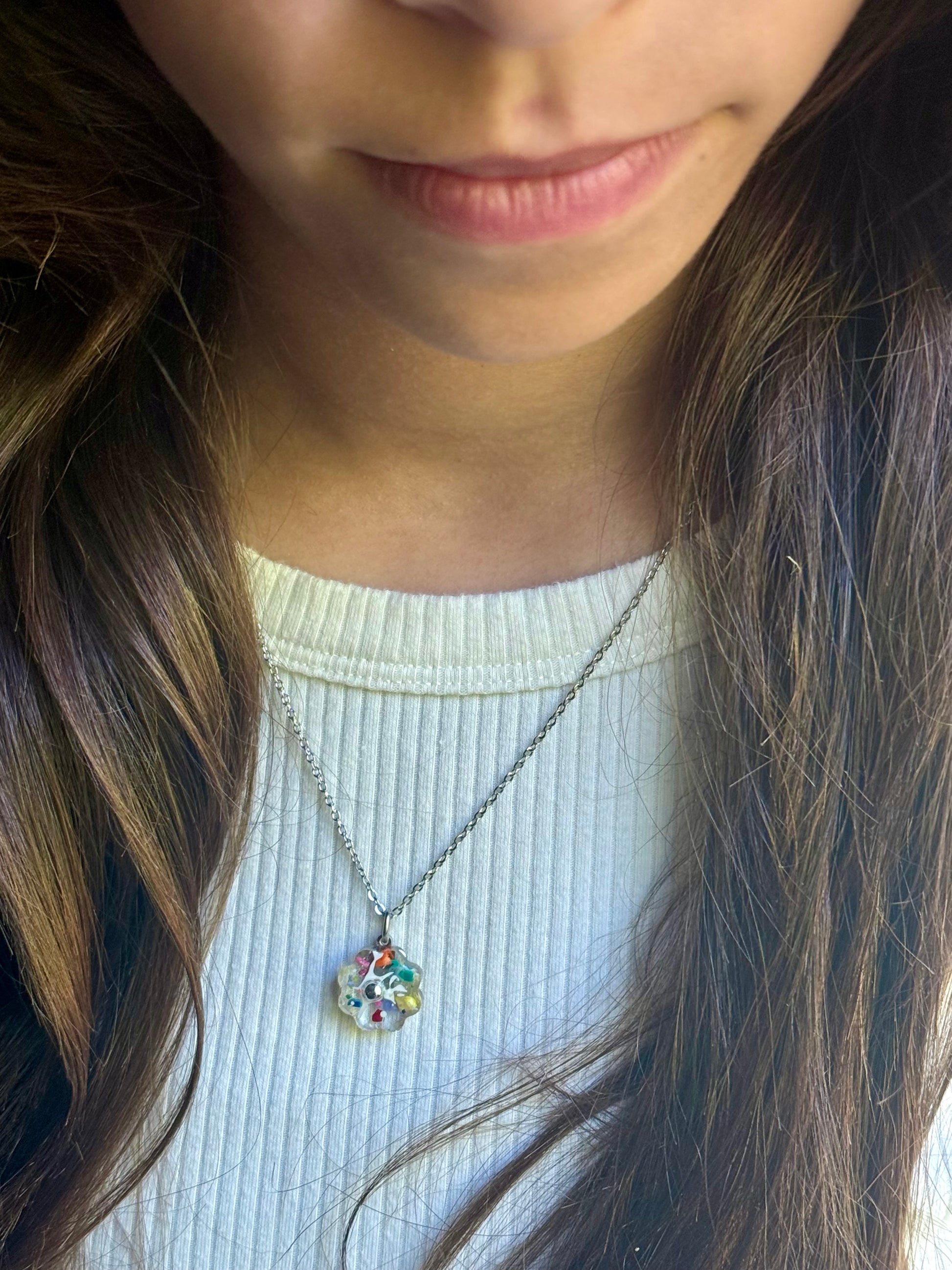 clear flower pendant handcrafted with crayons.  Chain included.  Crayonfetti crayon jewelry by mother daughter based in Atlanta