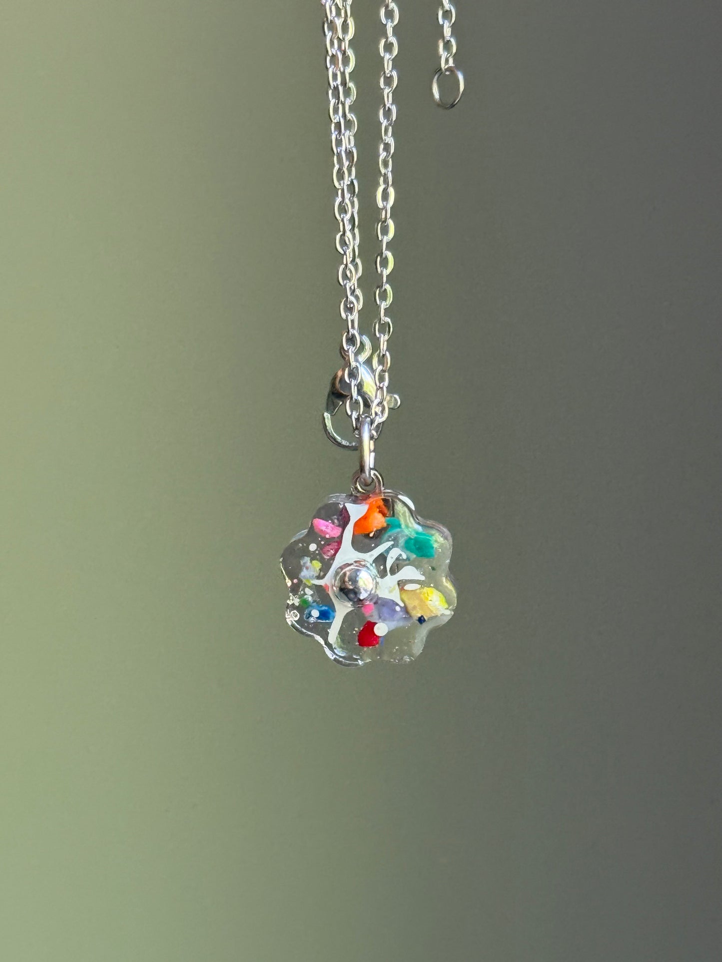 clear flower pendant handcrafted with crayons.  Chain included.  Crayonfetti crayon jewelry by mother daughter based in Atlanta