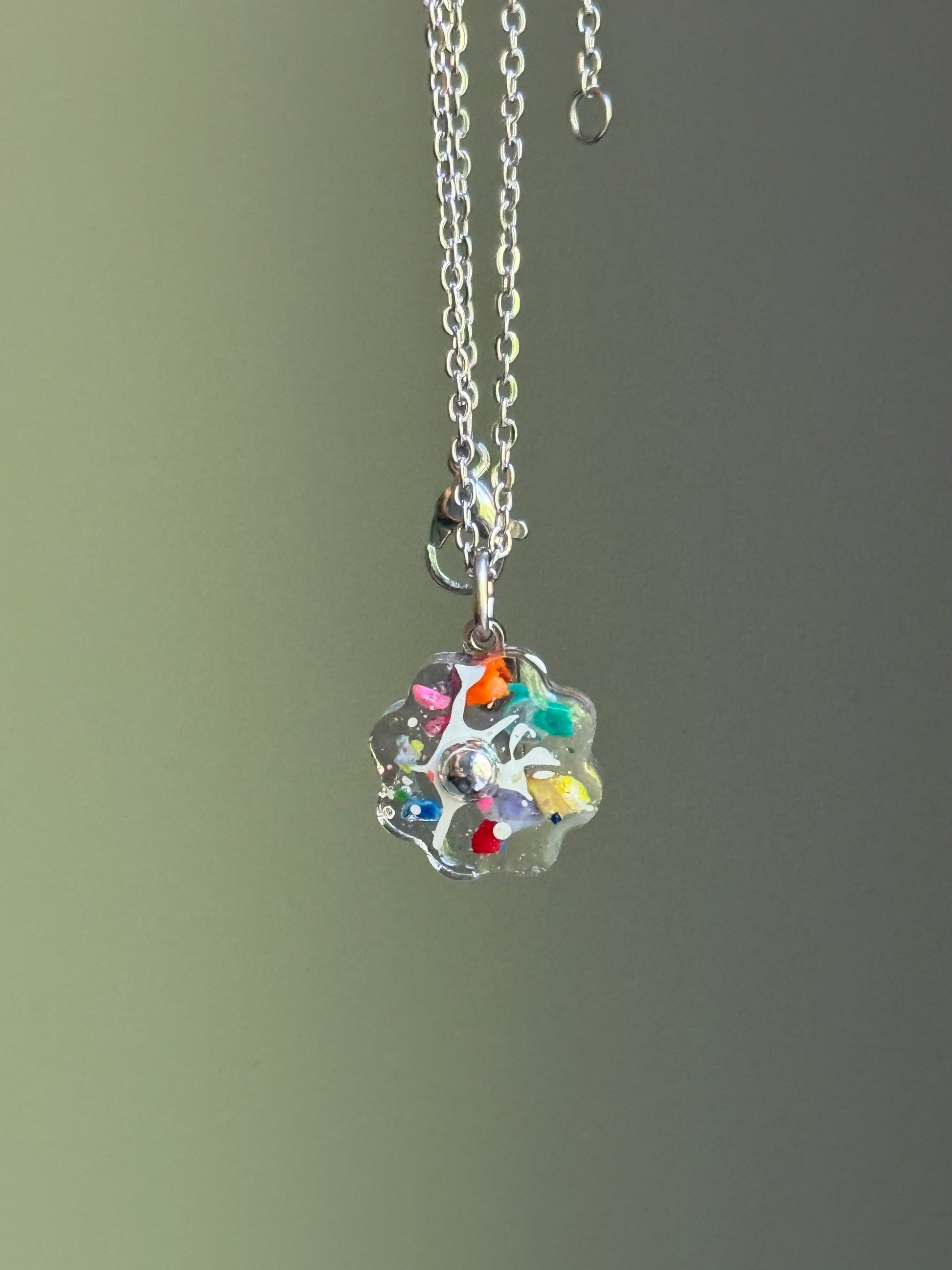 clear flower pendant handcrafted with crayons.  Chain included.  Crayonfetti crayon jewelry by mother daughter based in Atlanta