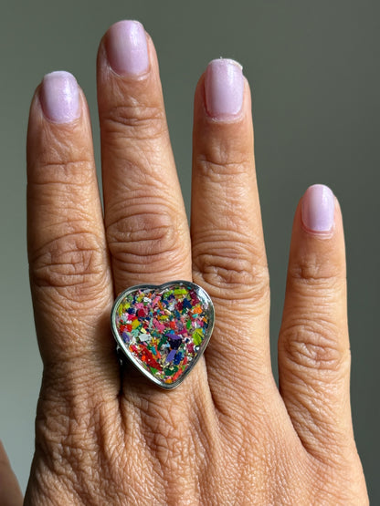 heart-shaped ring filled with colorful multicolor crayons.  crayonfetti crayon jewelry by mother daughter based in atlanta, ga