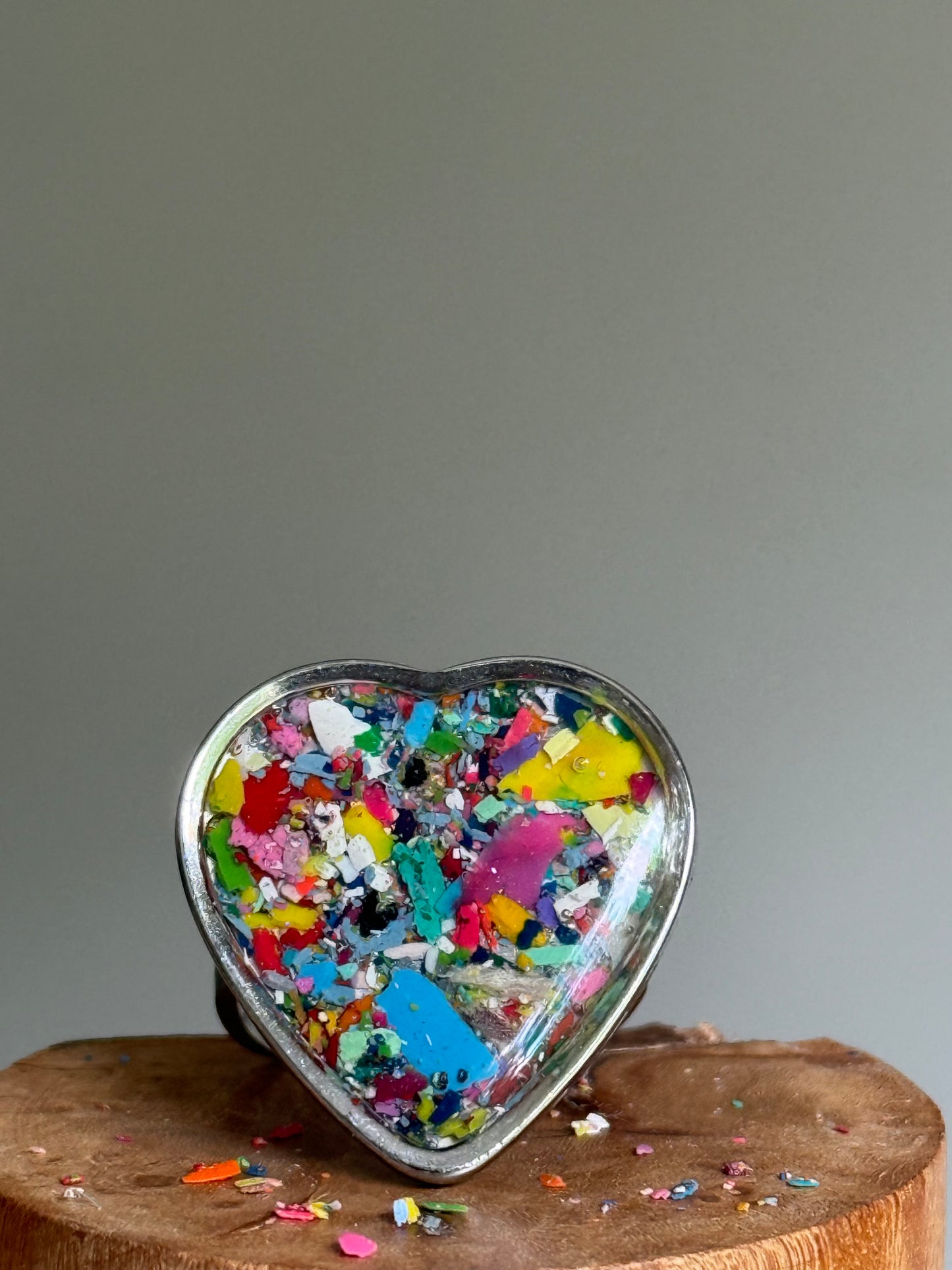 Handcrafted large heart-shaped ring made with recycled crayons, featuring a polished and sophisticated silhouette. Made by mother-daughter studio in Atlanta, GA.  It's crayon jewelry.