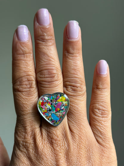 Handcrafted large heart-shaped ring made with recycled crayons, featuring a polished and sophisticated silhouette. Made by mother-daughter studio in Atlanta, GA.  It's crayon jewelry.