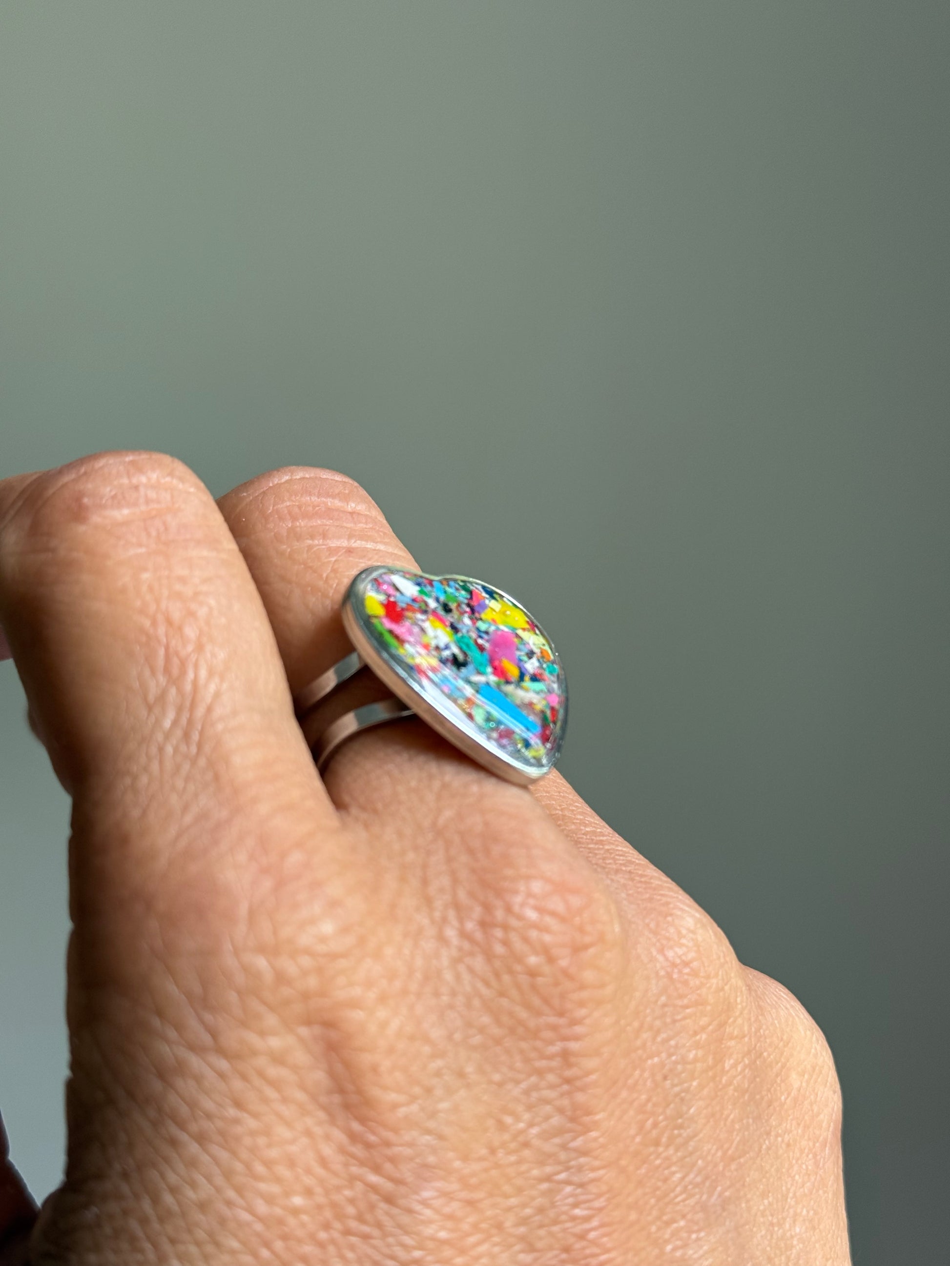 Mixed Fragments colorful crayon shavings heart ring upcycled handmade jewelry. Crayon jewelry by Crayonfetti, mother-daughter based in Atlanta.