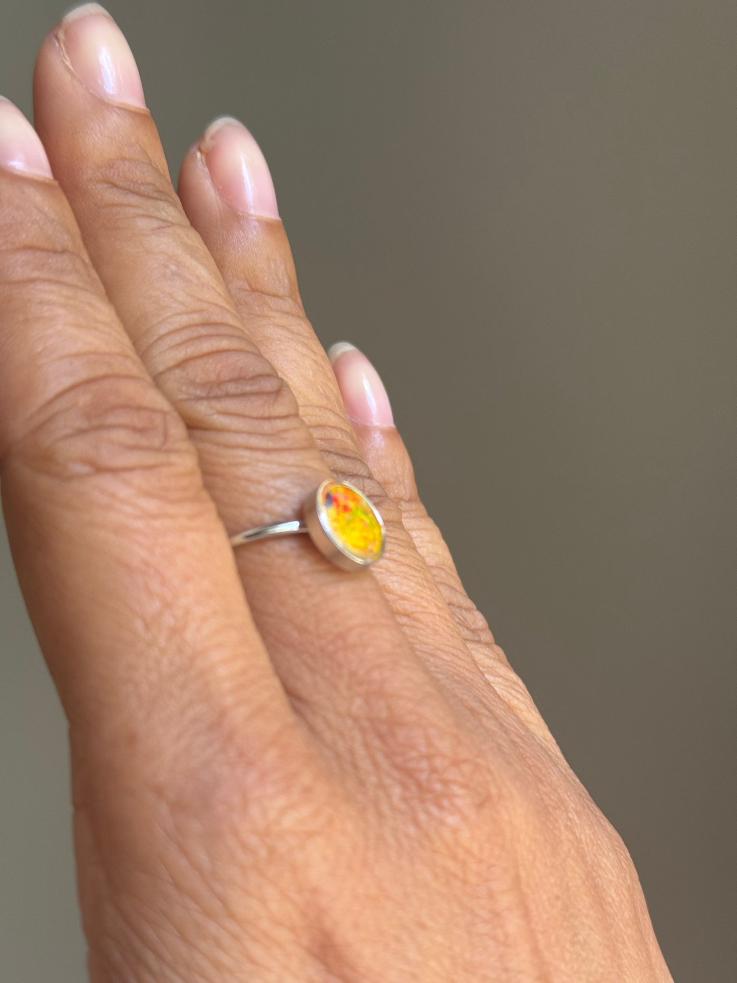 small round ring filled with crayon fragments. crayon jewelry by crayonfetti