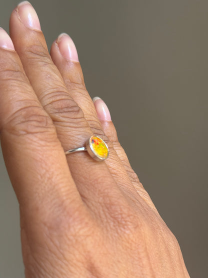 small round ring filled with crayon fragments. crayon jewelry by crayonfetti