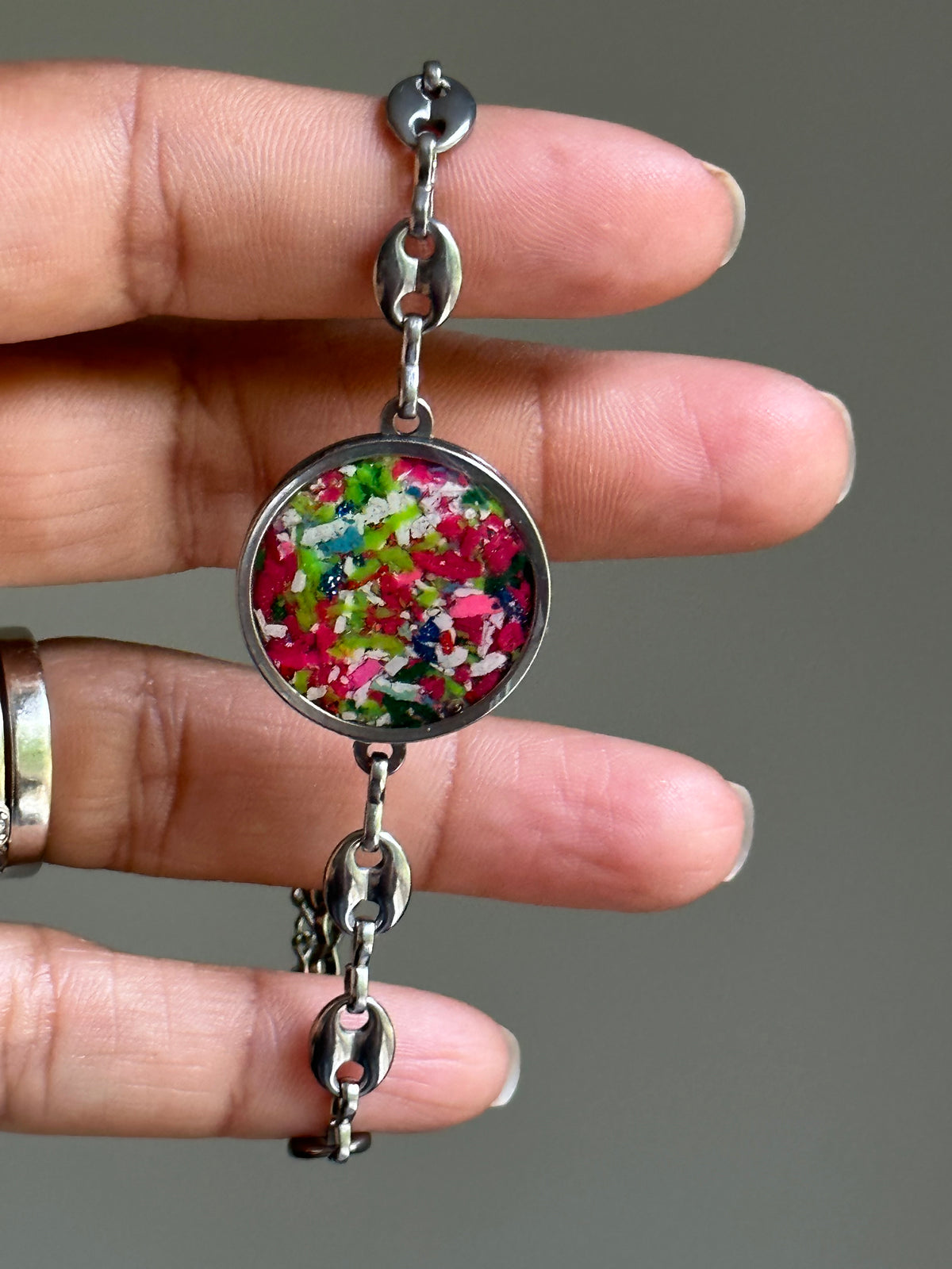 Multicolor crayon jewelry bracelet made with durable stainless steel.