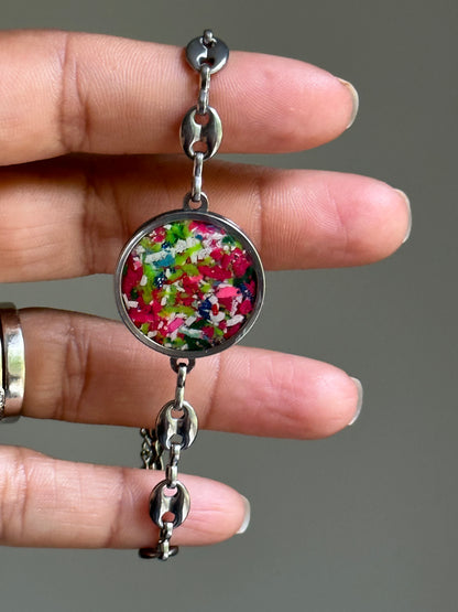 Multicolor crayon jewelry bracelet made with durable stainless steel.