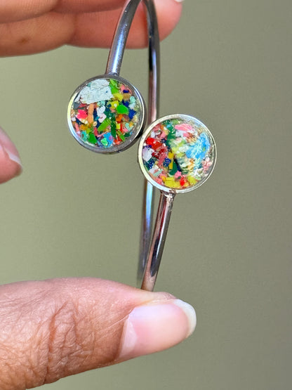 Hand holding crayon bracelet by crayonfetti