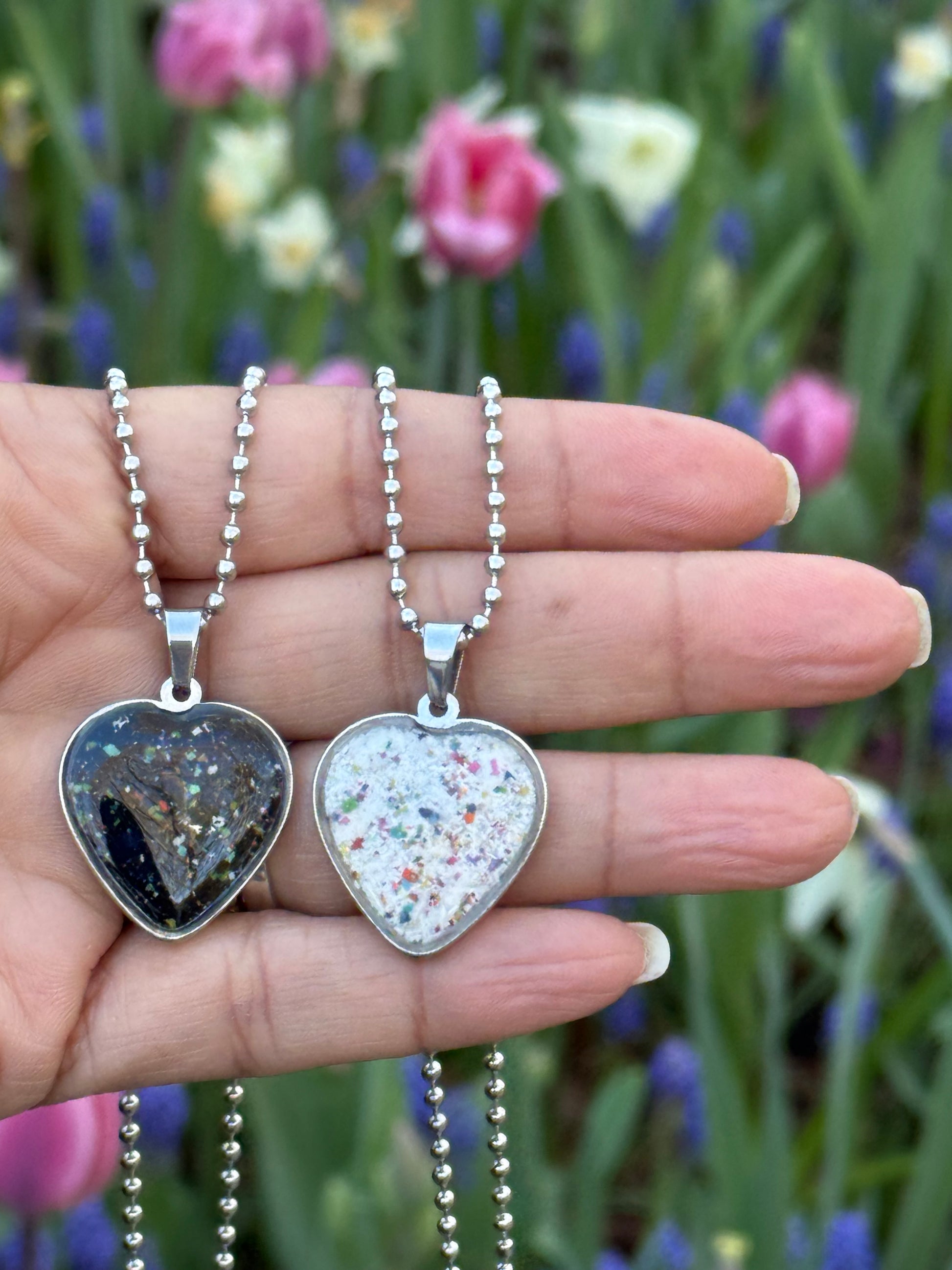 White freckled crayon filled heart shaped stainless steel pendant. Crayon jewelry by mother-daughter based in Atlanta, GA.