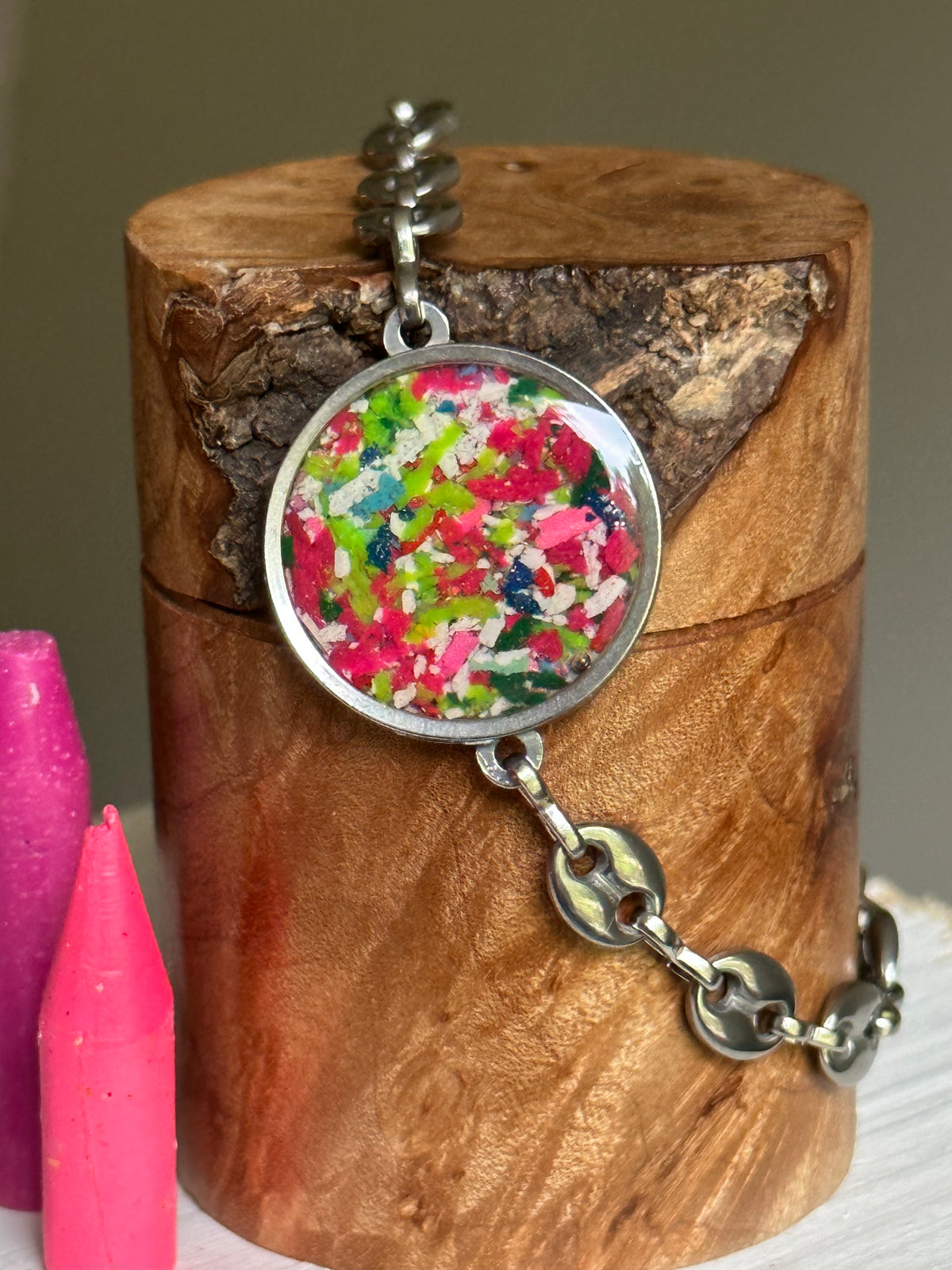 Hypoallergenic stainless steel bracelet with colorful reclaimed crayons.