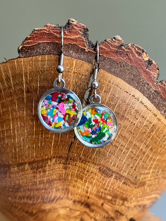 Stainless steel round dangling earrings with crayons.  Crayon jewelry
