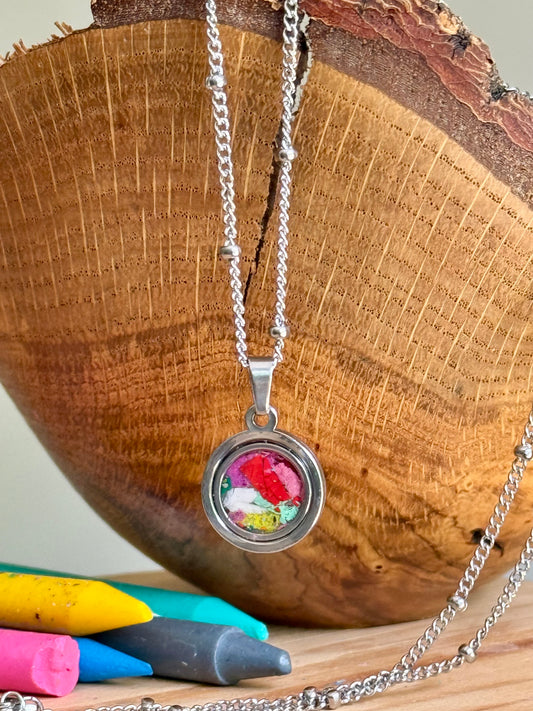Round colorful resin stainless steel pendant necklace in hypoallergenic stainless steel bezel frame for women and teachers.