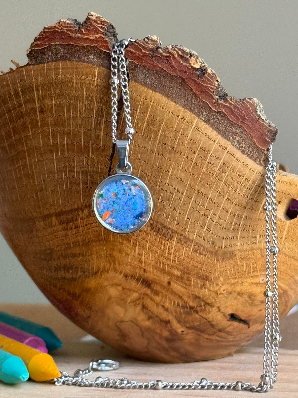 Sky blue round pendant necklace with orange accents in hypoallergenic stainless steel, unique gift for her.