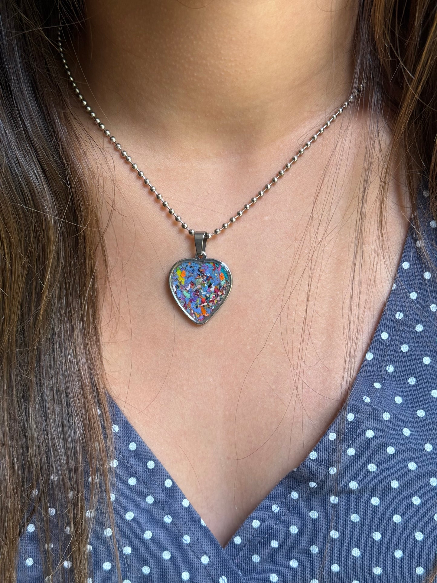 Close up of our periwinkle crayon heart pendant by crayonfetti