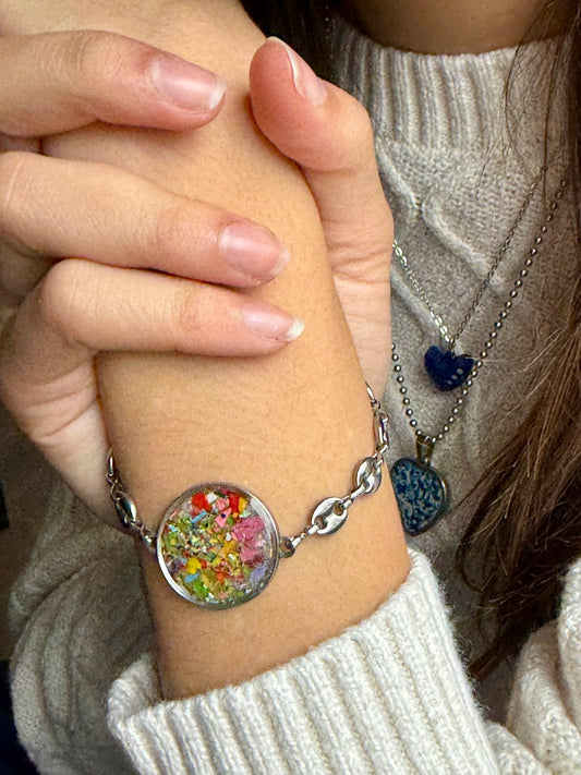 Mariner Viva stainless steel bracelet featuring colorful reclaimed crayon shavings.