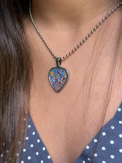 person wearing our crayonfetti heart shaped pendant, crayon jewelry