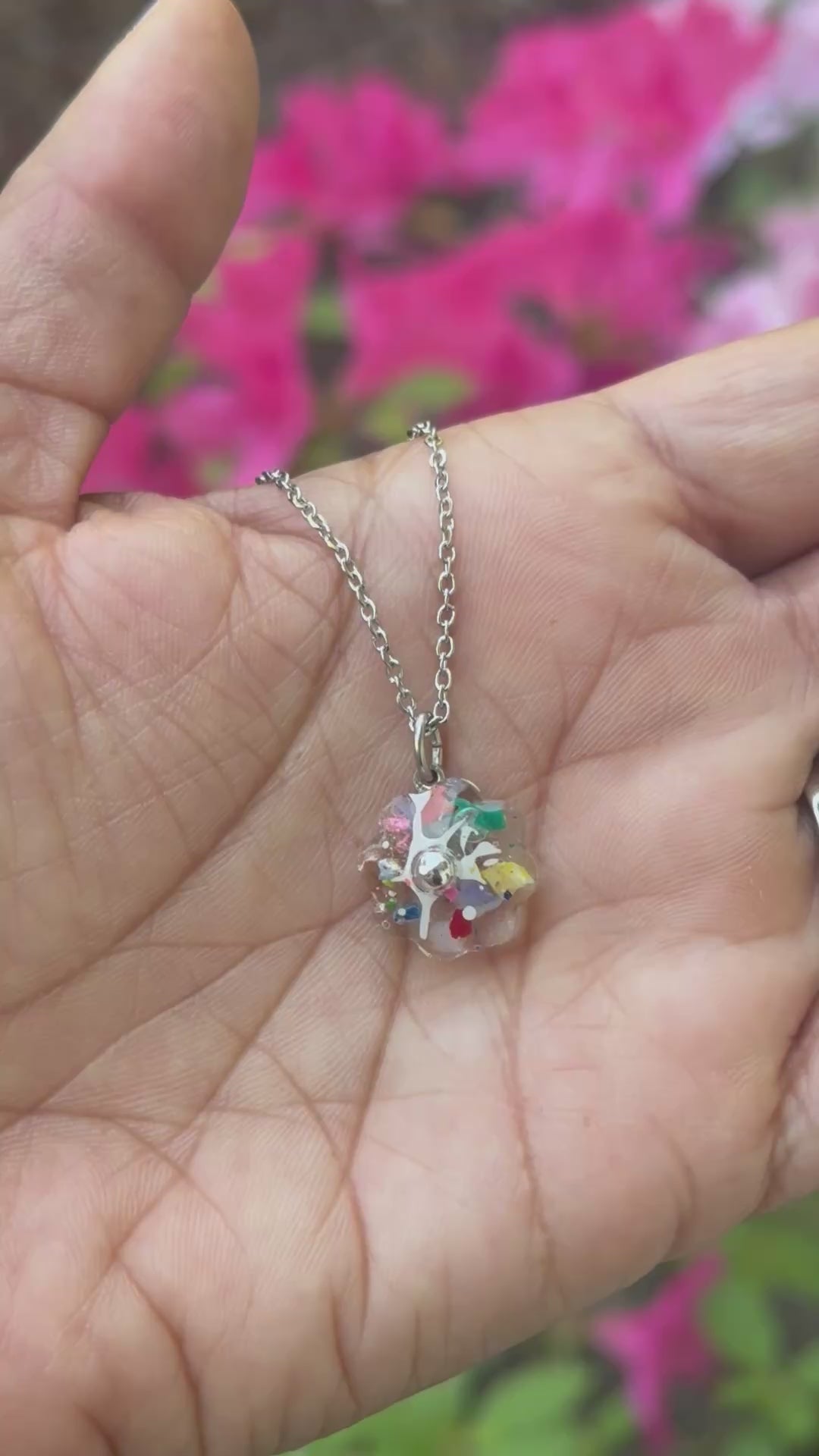 clear flower pendant handcrafted with crayons.  Chain included.  Crayonfetti crayon jewelry by mother daughter based in Atlanta