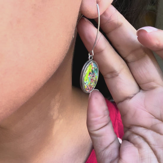 Our Prisma earrings are handcrafted with recycled crayons. Lightweight and colorful statement earrings. A vibrant and joyful sustainable jewelry statement from our mother-daughter studio in Atlanta, GA.