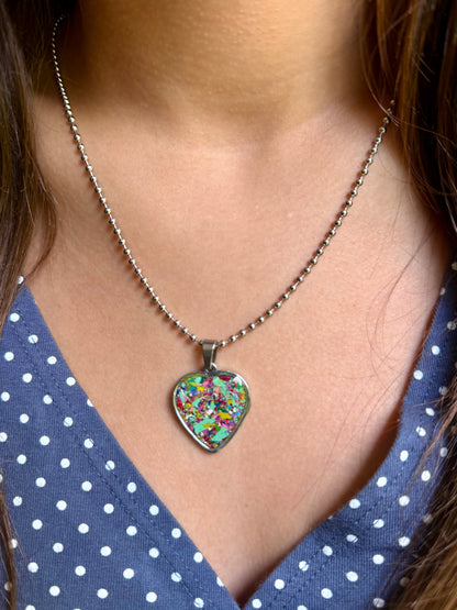 Colorful heart pendant made from recycled crayons, unique crayon jewelry handcrafted in Georgia