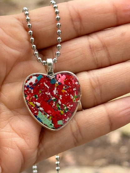 heart pendant filled with crayon shavings by crayonfetti